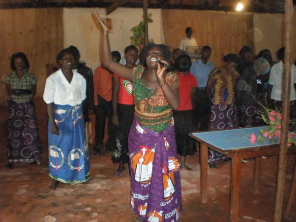 Mrs Nkanza, pastor’s wife, leading in worship
